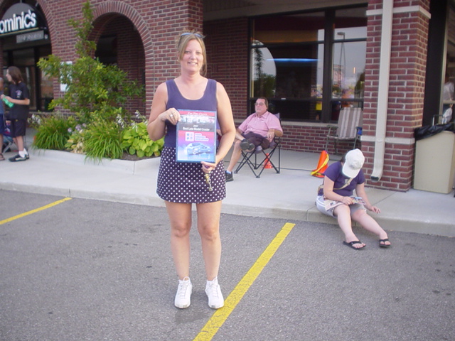 A smiling Diana Protrowski is a happy cruzer award winner.