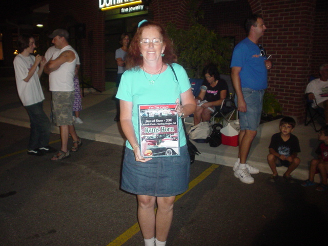 Marg Kaczor beams with her RH best of Show for her super 71 Ford F100.