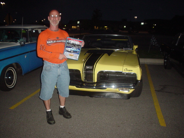 Steve Meray beams over his PC Best Muscle Car award for his beautiful 70 Cougar..