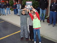 John Petro (center) & his helpers
