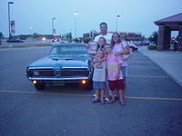 Rick Ohsiek & family enjoy their SF Outstanding Cruzer award for their 68 Cougar.
