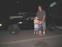 Steve Petro's family grasp the 4 Seasons Best Late Model plaque for his nice 87 Buick.