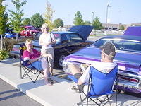 Deb & Tim Jacoby with Ginny Savage ...are you talking about cars?