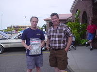 Dwaye Hrynyk congratulates John Difillipo for his Best Late Model Cruzer award.