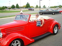 Bert Bernardi wins his award for his awesome 1936 Ford convertible.