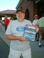 Dan Szlaga enjoys his Best Ford prize.